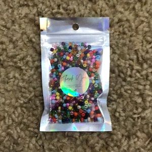 sea bead confetti with comfortable stretchy string.